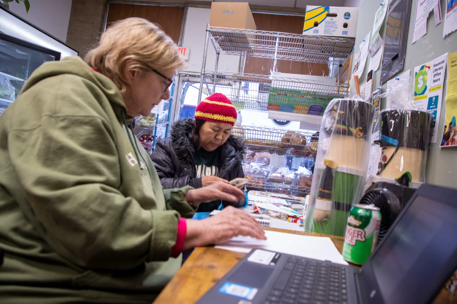 Volunteers and neighbors at the Wilkinsburg Community Ministry food pantry